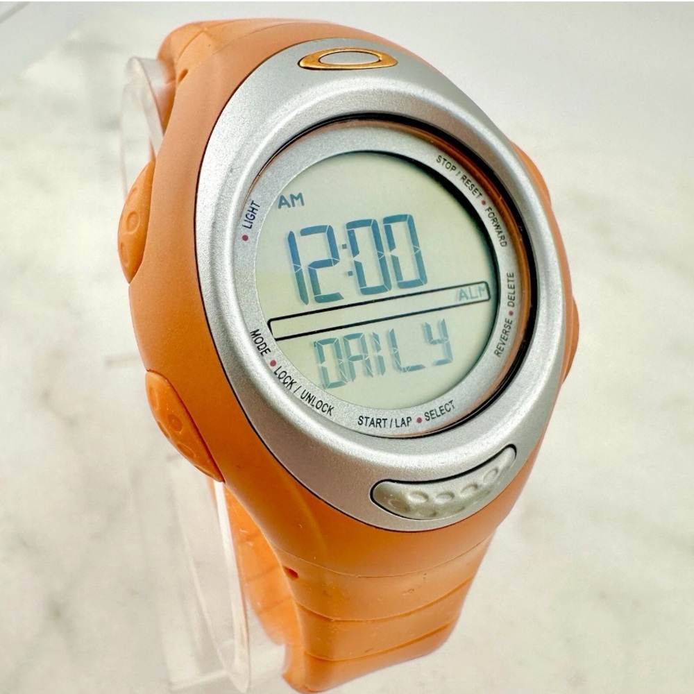 Oakley Orange and Silver Smartwatch. Women’s watch!